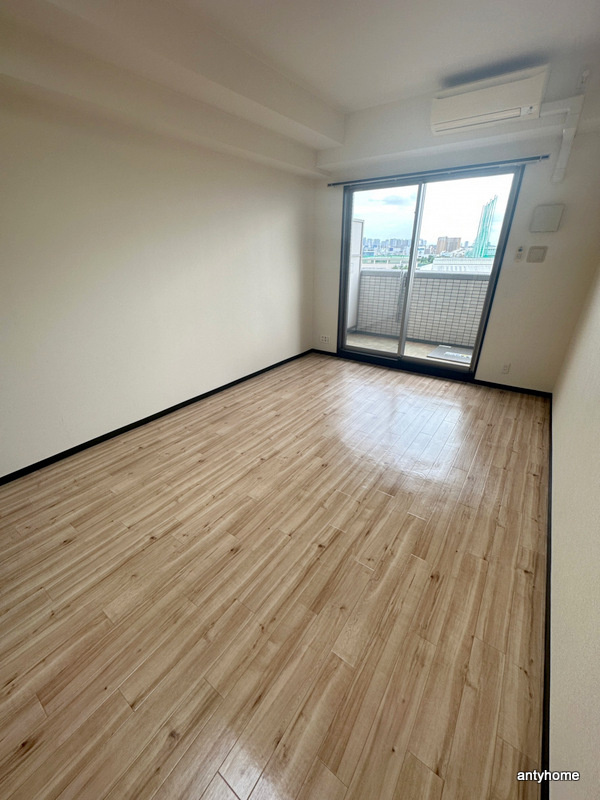 プレジオ江坂　仲介手数料無料の寝室