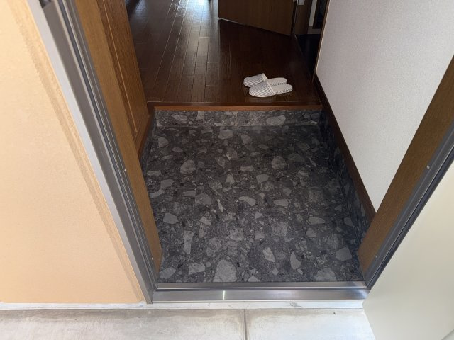 パーソナル飯田１２の玄関