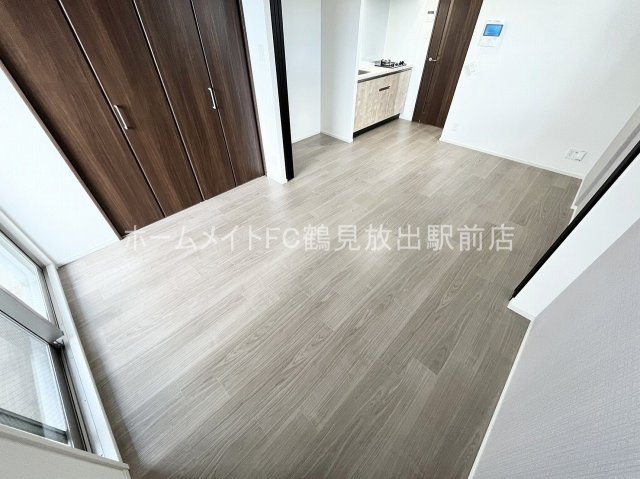 グランカーサ高井田の洋室