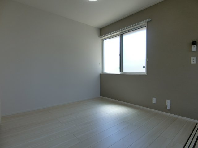 グランプレミア新開の洋室