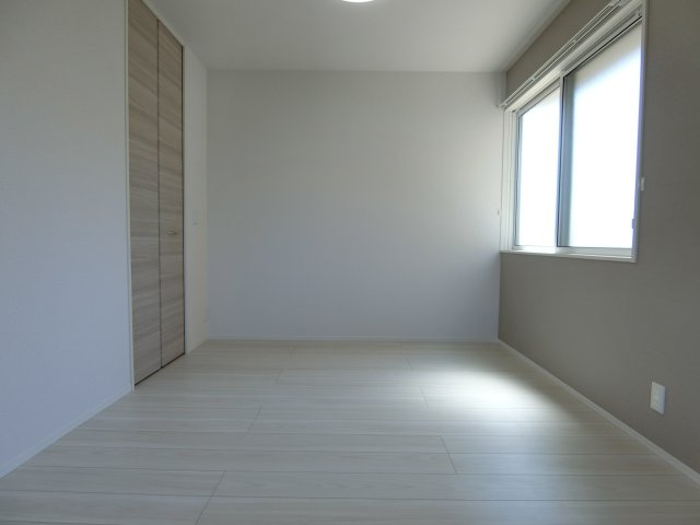 グランプレミア新開の洋室