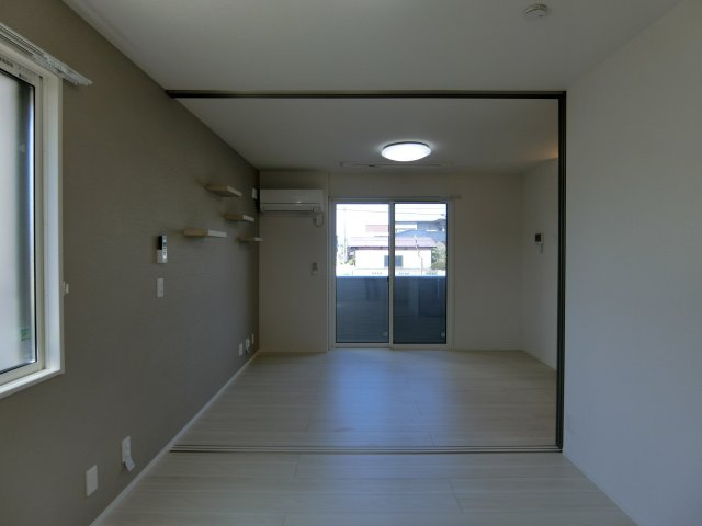 グランプレミア新開の洋室