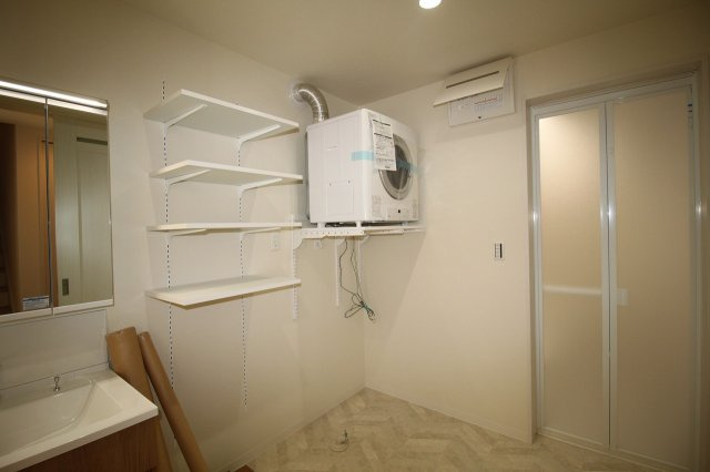 介良　新築戸建　西棟の脱衣所|乾燥機　収納