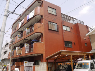 【外観】 | 閑静な住宅街に立地する総タイル張りのRC造の建物です。