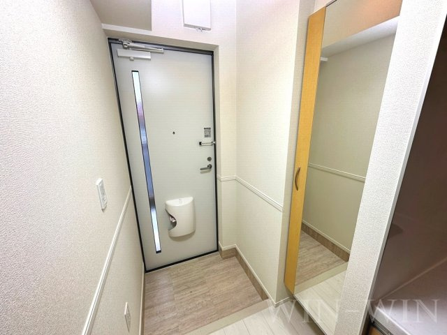 エ・ヴィーバ草間の玄関