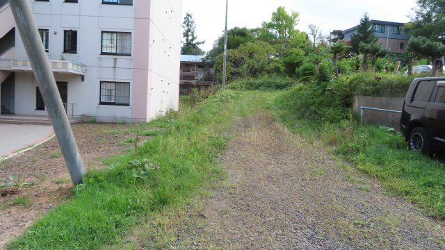 網走市桂町２丁目４１番地７、４４番地４、４５番３９　中古売共同住宅の外観|私道上り
