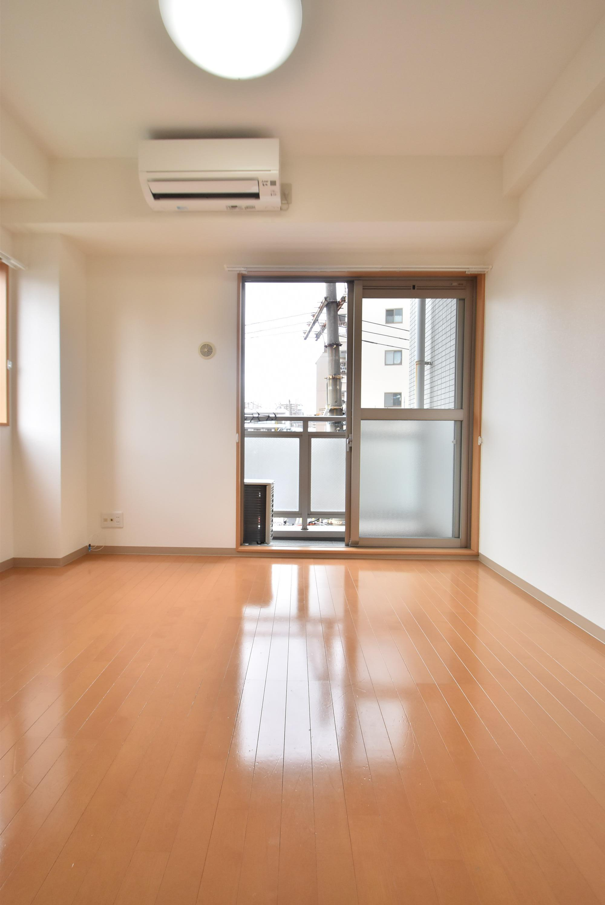 大阪市都島区中野町４丁目の賃貸マンションの居間・リビング