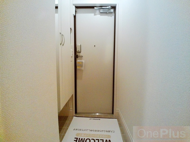 コンフォート西岡本の玄関