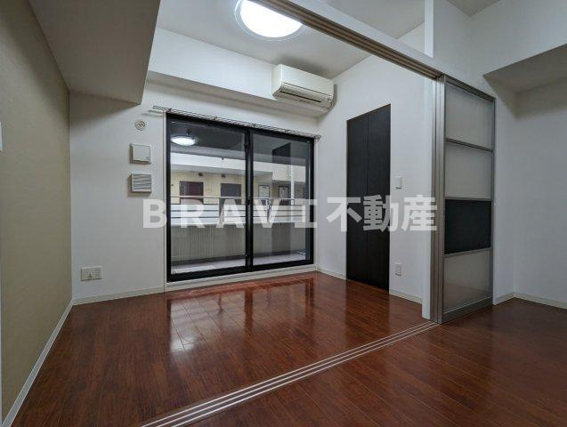 グランプラス谷町 BRAVI不動産の洋室