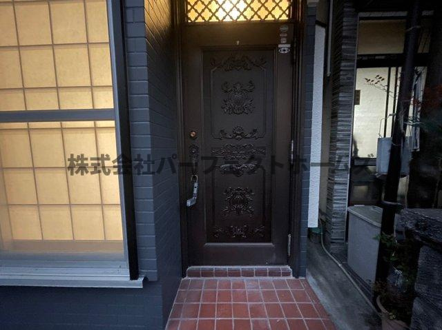 香里西之町戸建 賃貸の玄関