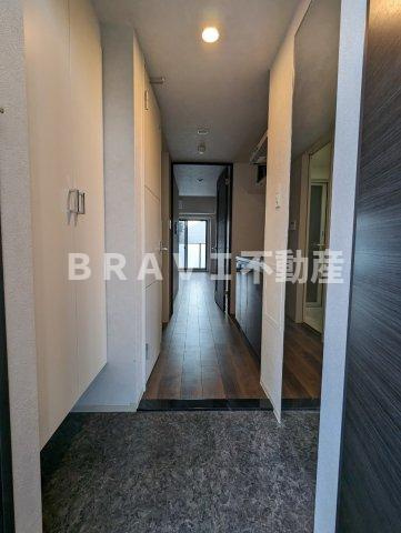 セイワパレス深江南 BRAVI不動産の玄関