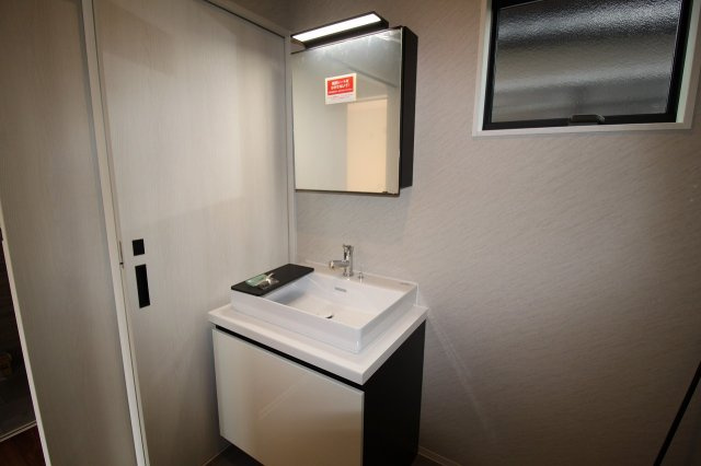 鴨部高町　中古戸建　西棟（未入居）の独立洗面台