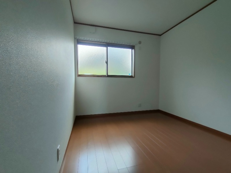 奈良市百楽園５丁目のアパートの洋室