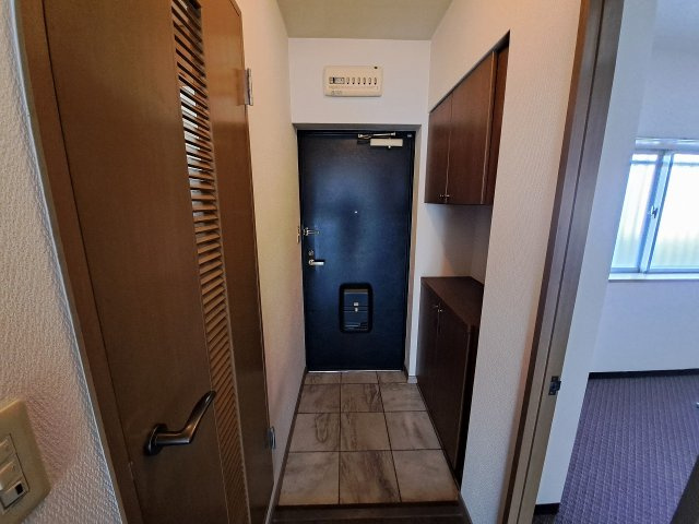 ロイヤル久寿川の玄関