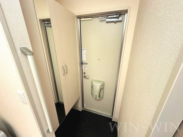 コンフォール西小鷹野の玄関