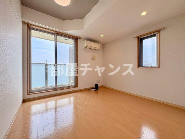 KマンションつるまいⅡの居間・リビング