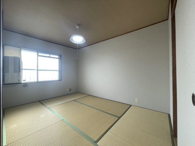 マンション沢良宜A棟の寝室