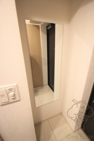 レジュールアッシュ三国本町の玄関