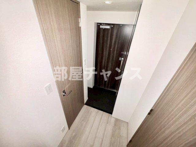 プレサンス鶴舞パークグラッドの玄関