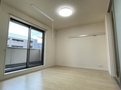 グランドヴィラ大江の洋室