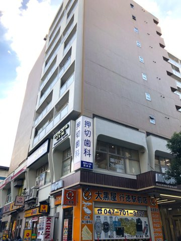 ファミリーコーポ南行商協ビルの外観