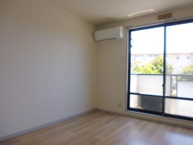 サンビレッジ児島Hの居間・リビング|洋室