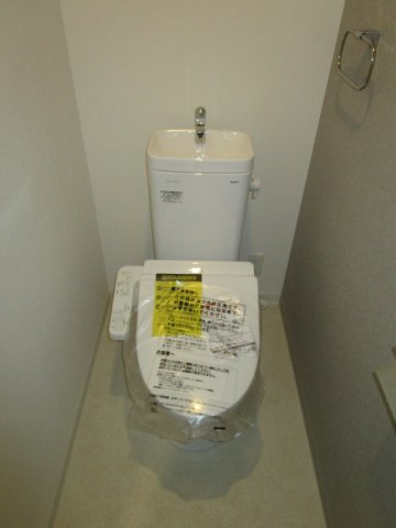 大阪市淀川区新北野１丁目の賃貸マンションのトイレ