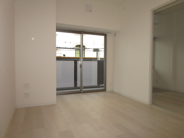 大阪市淀川区新北野１丁目の賃貸マンションの居間・リビング