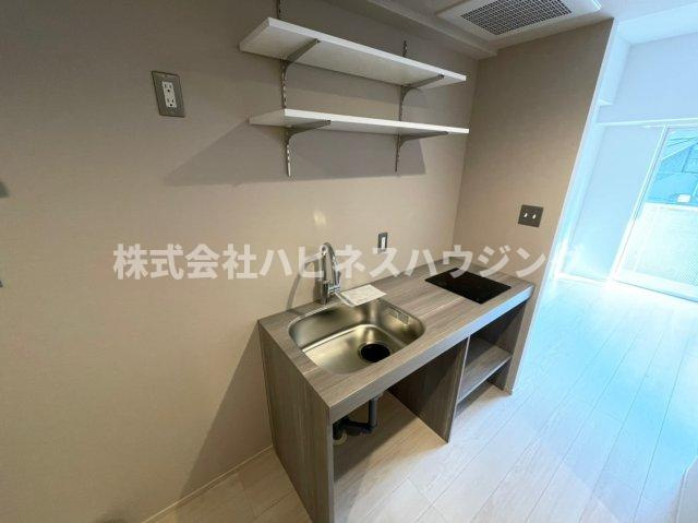 ART APARTMENT IN Ootaka-no-Moriのキッチン