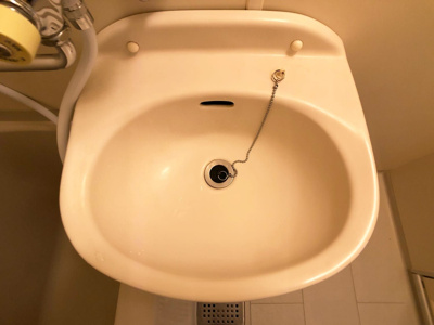 【洗面所】 | マリンズ別府 | 別号室の写真になります。現況優先。