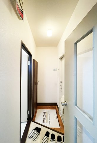 コスモ福万　Ａ棟の玄関