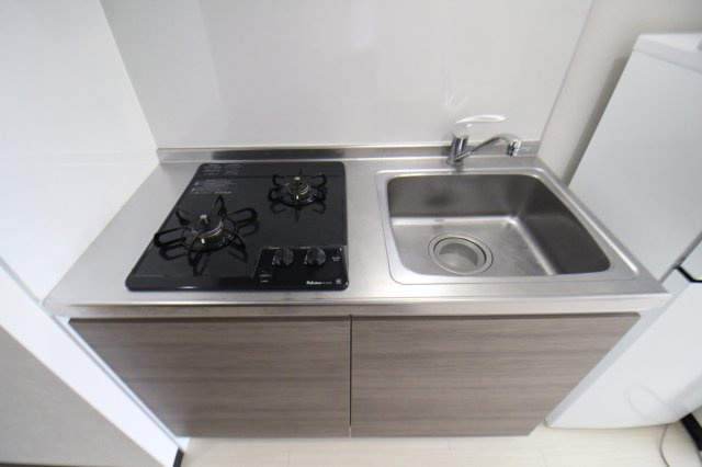 グランパシフィック花園北Ⅱのキッチン|コンパクトなキッチンで掃除もラクラク