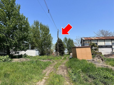 【前面道路含む現地写真】 | 北区新琴似町 | 私道部分（矢印箇所が本物件）