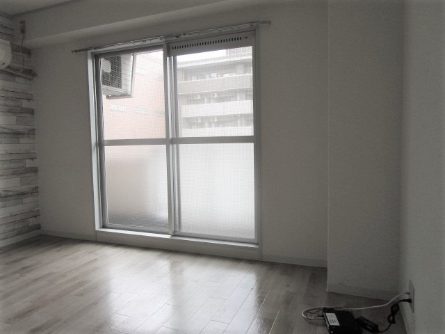 大阪市淀川区十三東１丁目の賃貸マンションの寝室