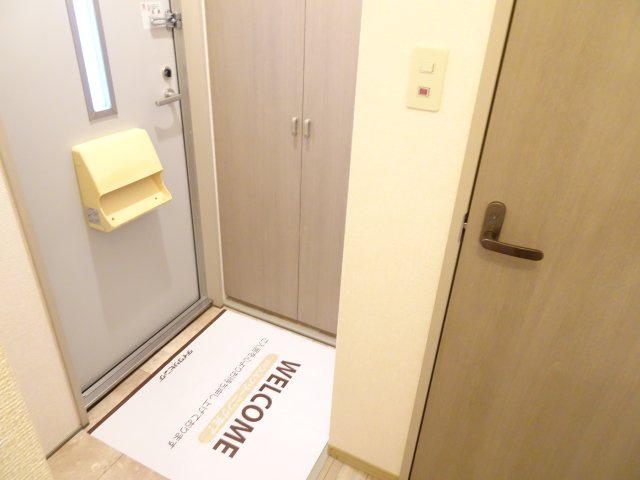 レジデンスかとう　Ａ棟の玄関