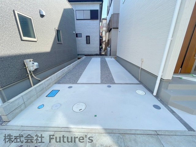 三郷市戸ケ崎3丁目　新築戸建　全7棟　6号棟の駐車場|カースペース縦列2台付き