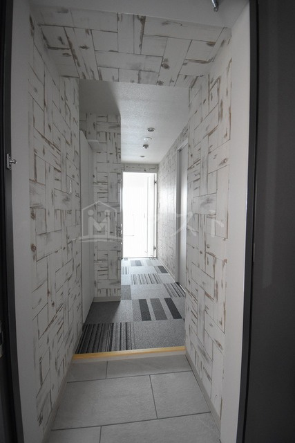 メゾニティ・クイーン阿波座の玄関