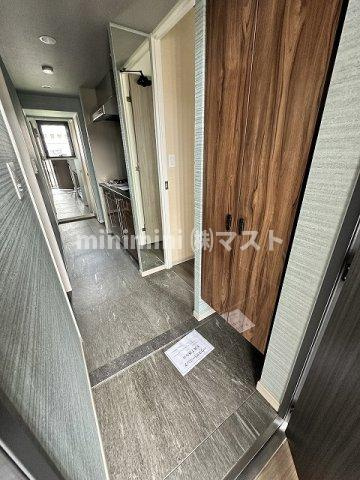 ファーストフィオーレ阿波座アクアの玄関