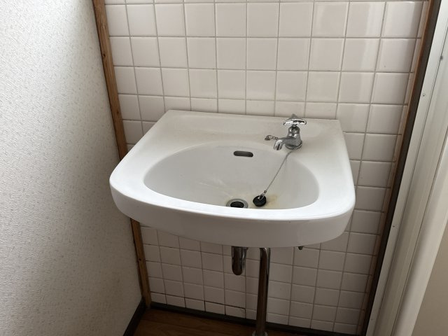 東今宿山名貸家の洗面所
