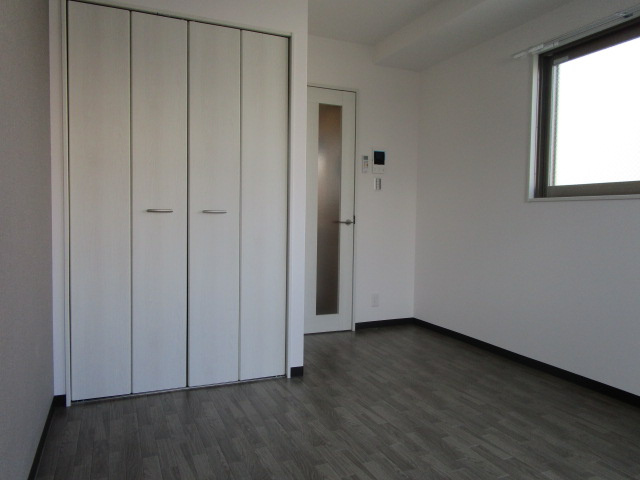 大阪市淀川区十三元今里２丁目の賃貸マンションの洋室