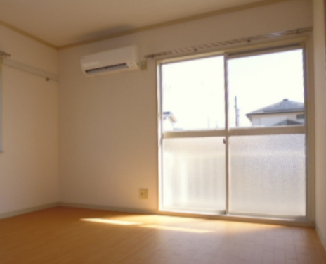 フレグランスまほろばＡの居間・リビング|洋室