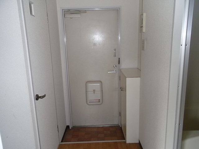 ルミエールUOZAKIの玄関