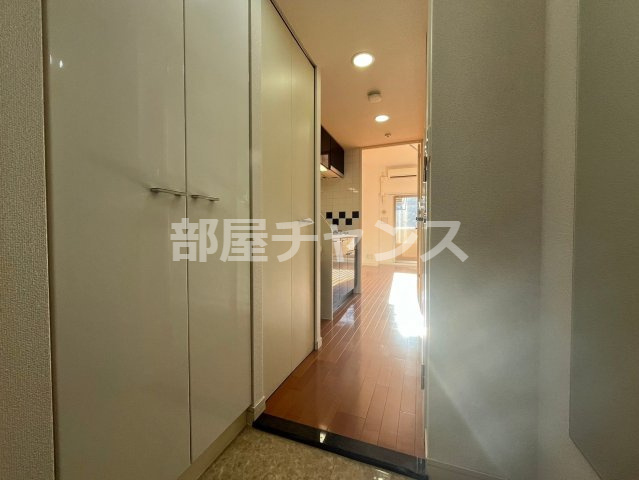 プレサンス泉セントマークの玄関