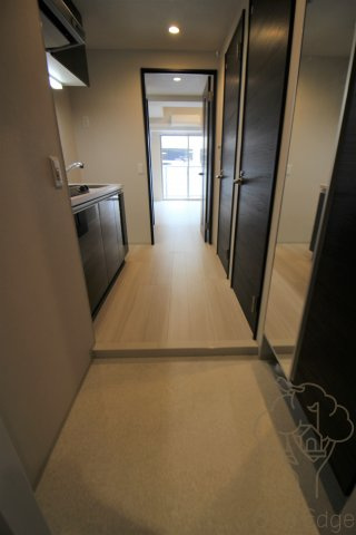 ウェルフォート十三本町の玄関