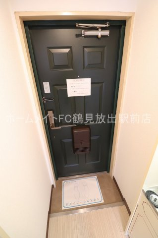 レアレア徳庵17番館の玄関