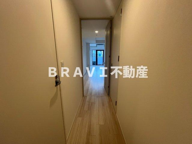 レジュールアッシュ谷町四丁目グランクラスの玄関