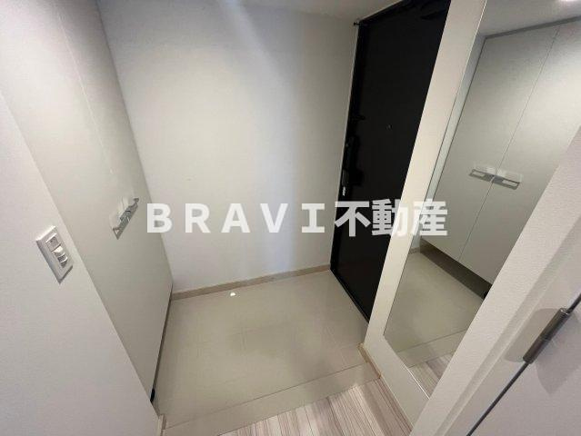 レジュールアッシュ谷町四丁目グランクラスの玄関