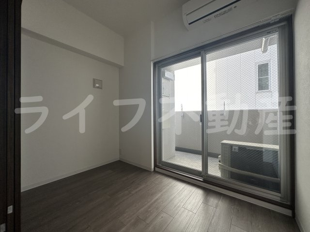 スプランディッド荒本駅前DUEの寝室