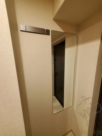 ファーストフィオーレ塚本リベルテの玄関