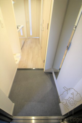 プレサンスOSAKA西中島リエゾンの玄関